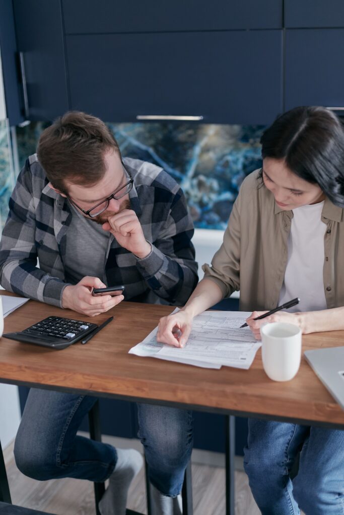 Married couple reviewing tax documents together for saver's credit eligibility