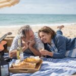 Senior couple enjoying a peaceful retirement by the ocean